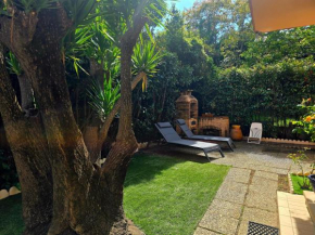 Duplex climatisé 100m2, jardin, garage individuel clos